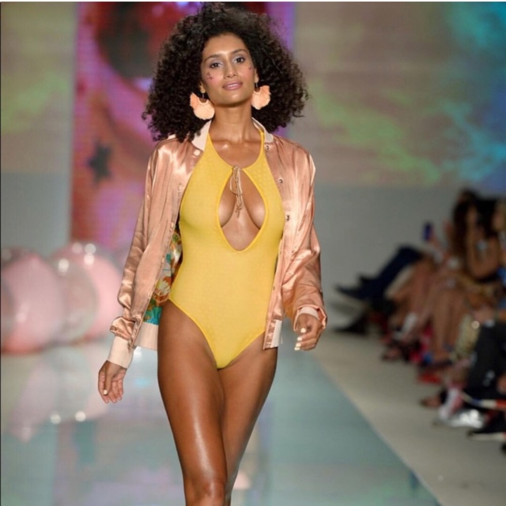 Lolli peekaboo one piece size medium. BNWT
